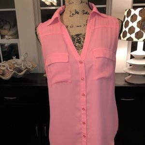 Women’s Soho melon colored top, size medium.